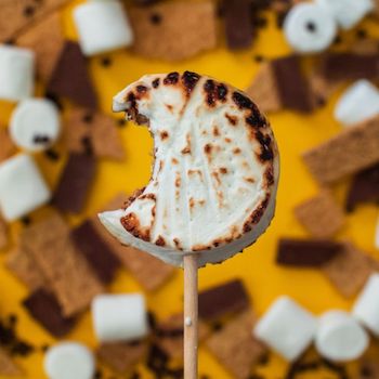 Roasted inside-out s'more on a stick