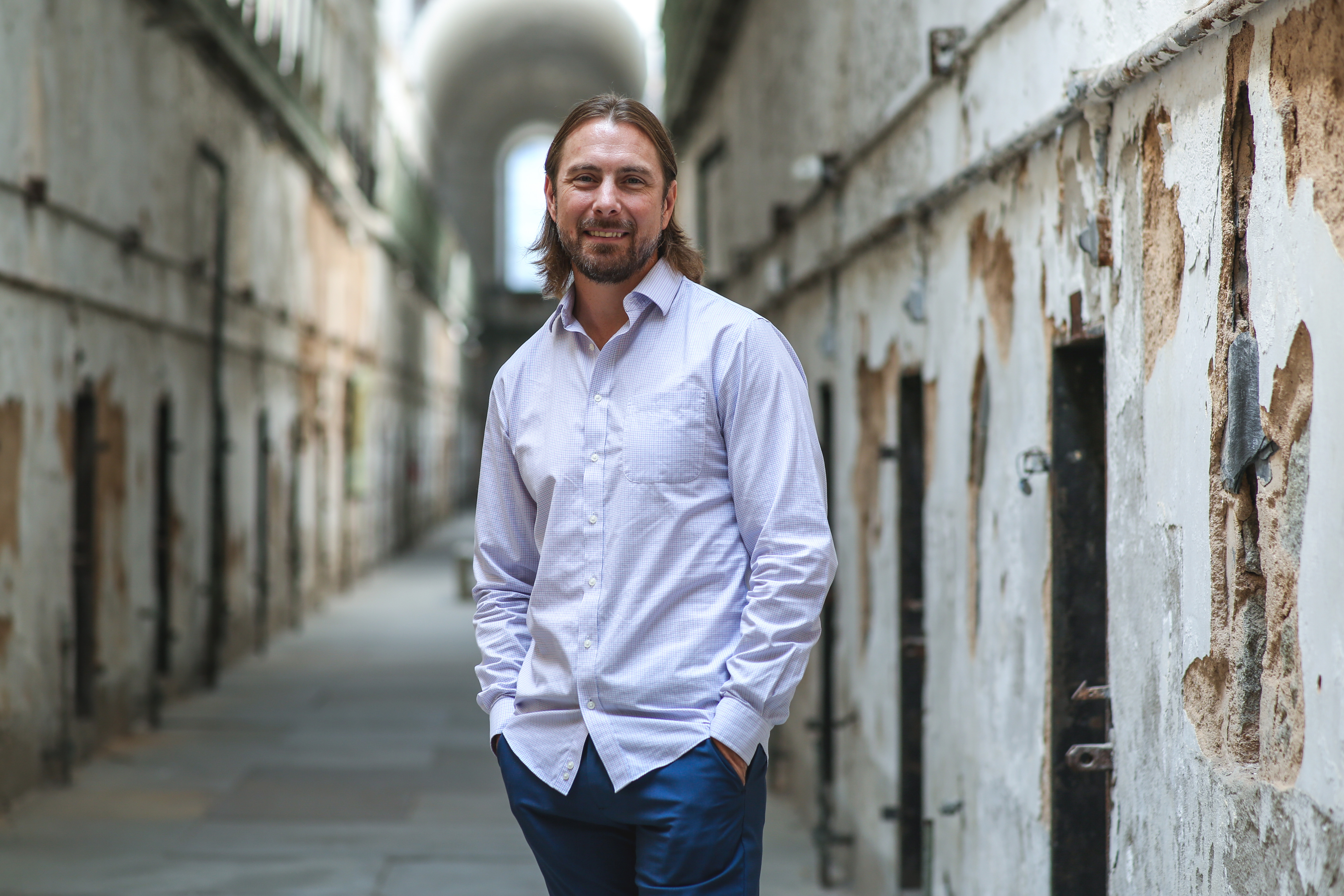 A photo of artist Cody Stuhltrager at Eastern State Penitentiary.